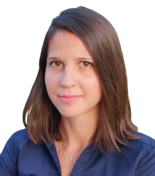 Professional woman team member representing Revology Analytics team.