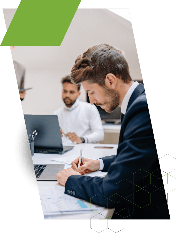 Business professionals discussing value-based pricing strategies in a meeting.