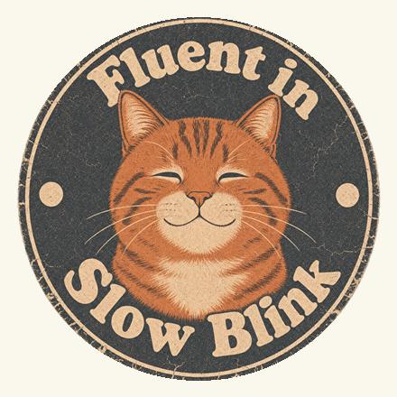 Fluent in Cat Fluent in Slow Blink — orange tabby badge design