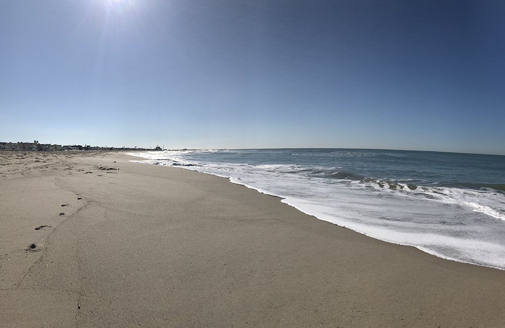 Sundrenched shoreline on Silver Strand Beach