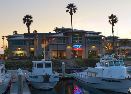 	View from the harbor at night of the Sea Fresh Grill & Market & Raw Bar