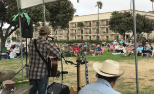 Musicians play to a crowd at Concerts by the Sea