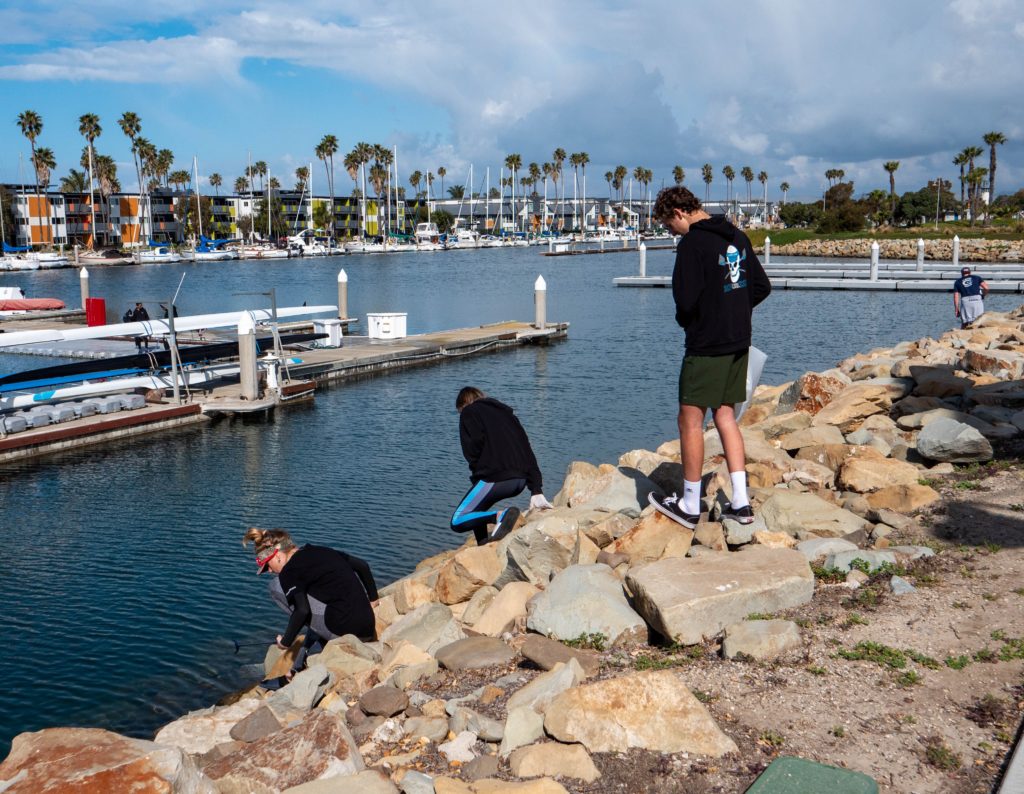 CIH Rowing Club members cleaning up the harbor