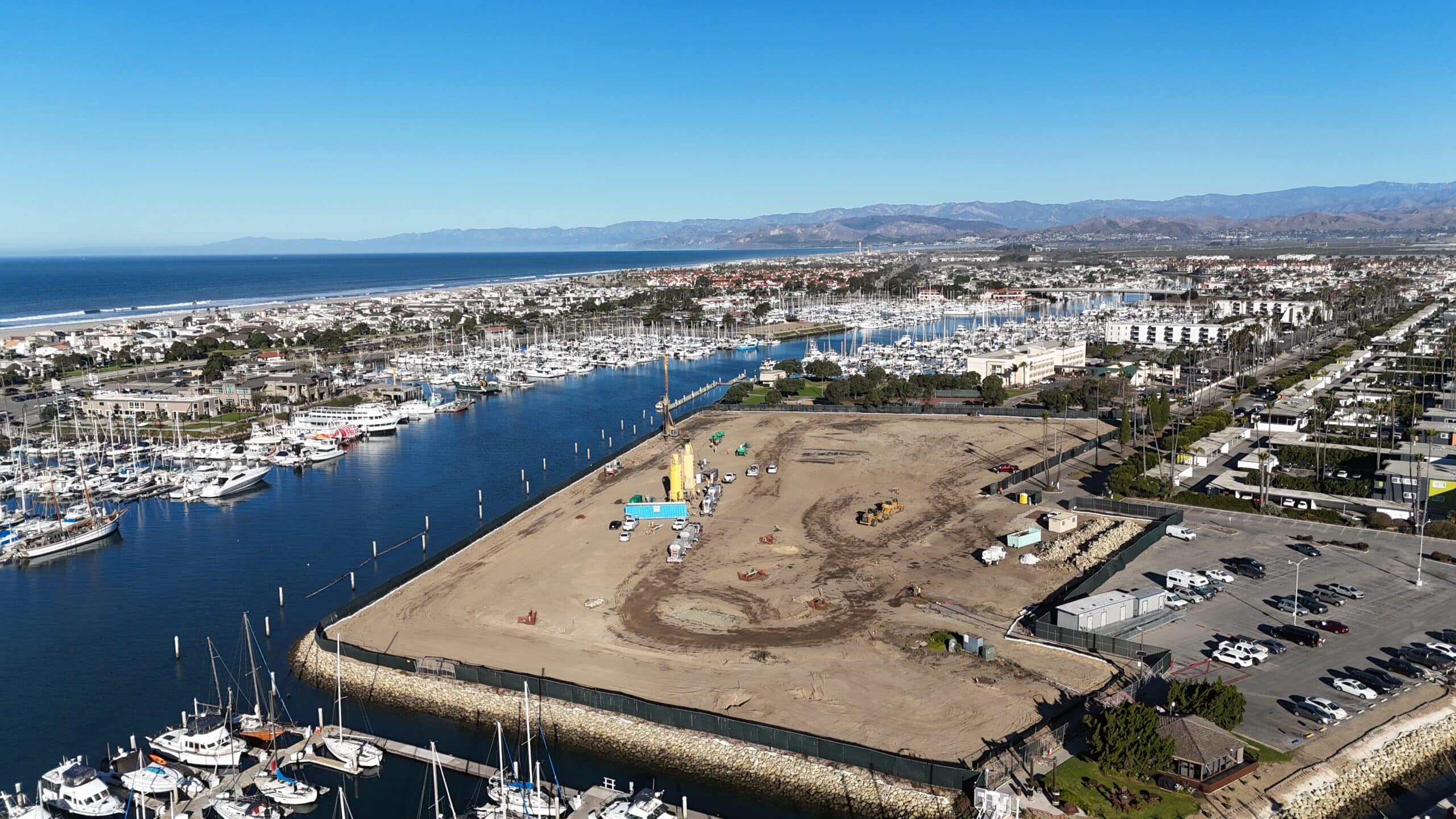 Aerial view of Channel Islands Harbor with ongoing construction and marina in California.