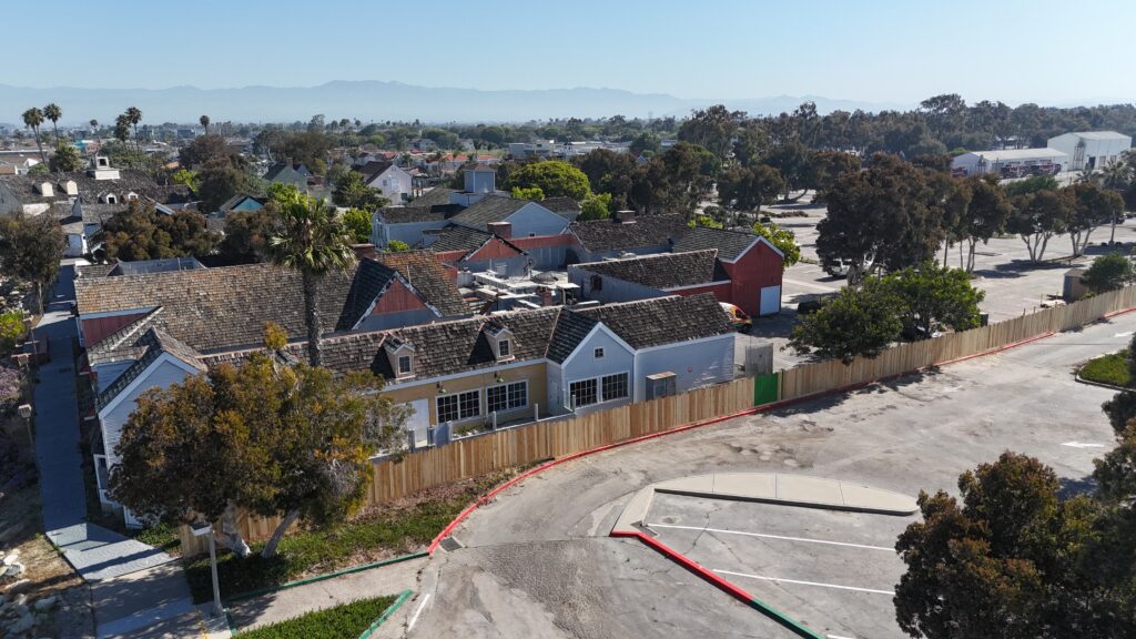 Aerial view of residential homes and parking lot near Channel Islands Harbor.