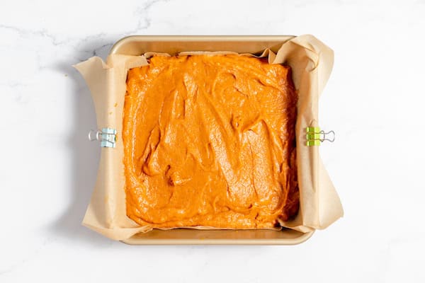 gluten free pumpkin batter in a cake pan