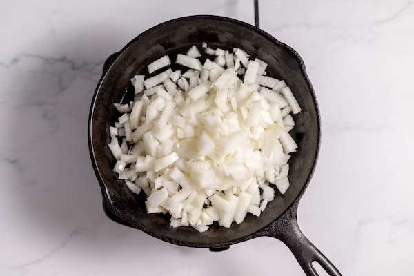 sauteing onions to add to the beans