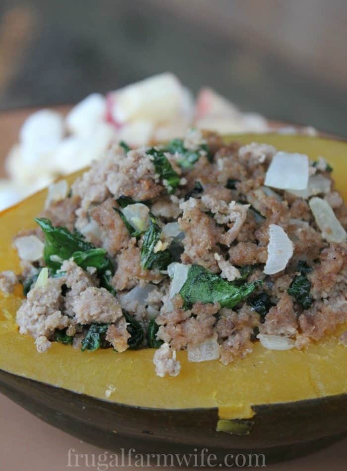 Image shows a close up of a stuffed acorn squash