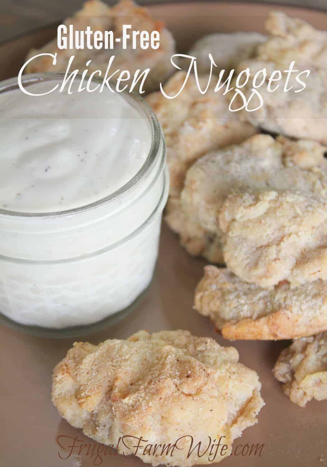 Image shows a close up of a plate of gluten free chicken nuggets and a jar of ranch dressing. Text above reads "Gluten-Free Chicken Nuggets"