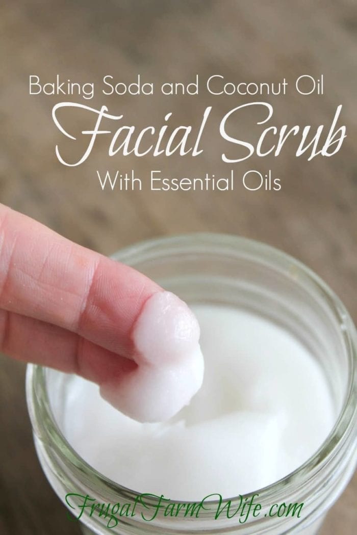 Photo shows two fingers dipping into a jar with text that reads "Baking Soda and Coconut Oil Facial Scrub with Essential Oils"