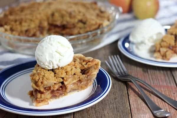 Image shows a GlutenFree Dutch Apple Pie on a plate served with ice cream