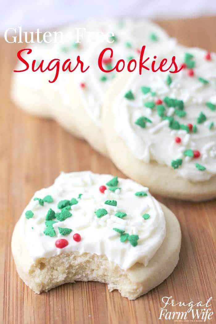 Image shows several large sugar cookies with white frosting and red and green decorations. Text reads "Gluten Free Sugar Cookies"
