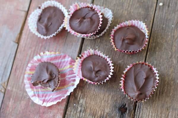 Photo shows several peppermint patties on a table, photographed from above
