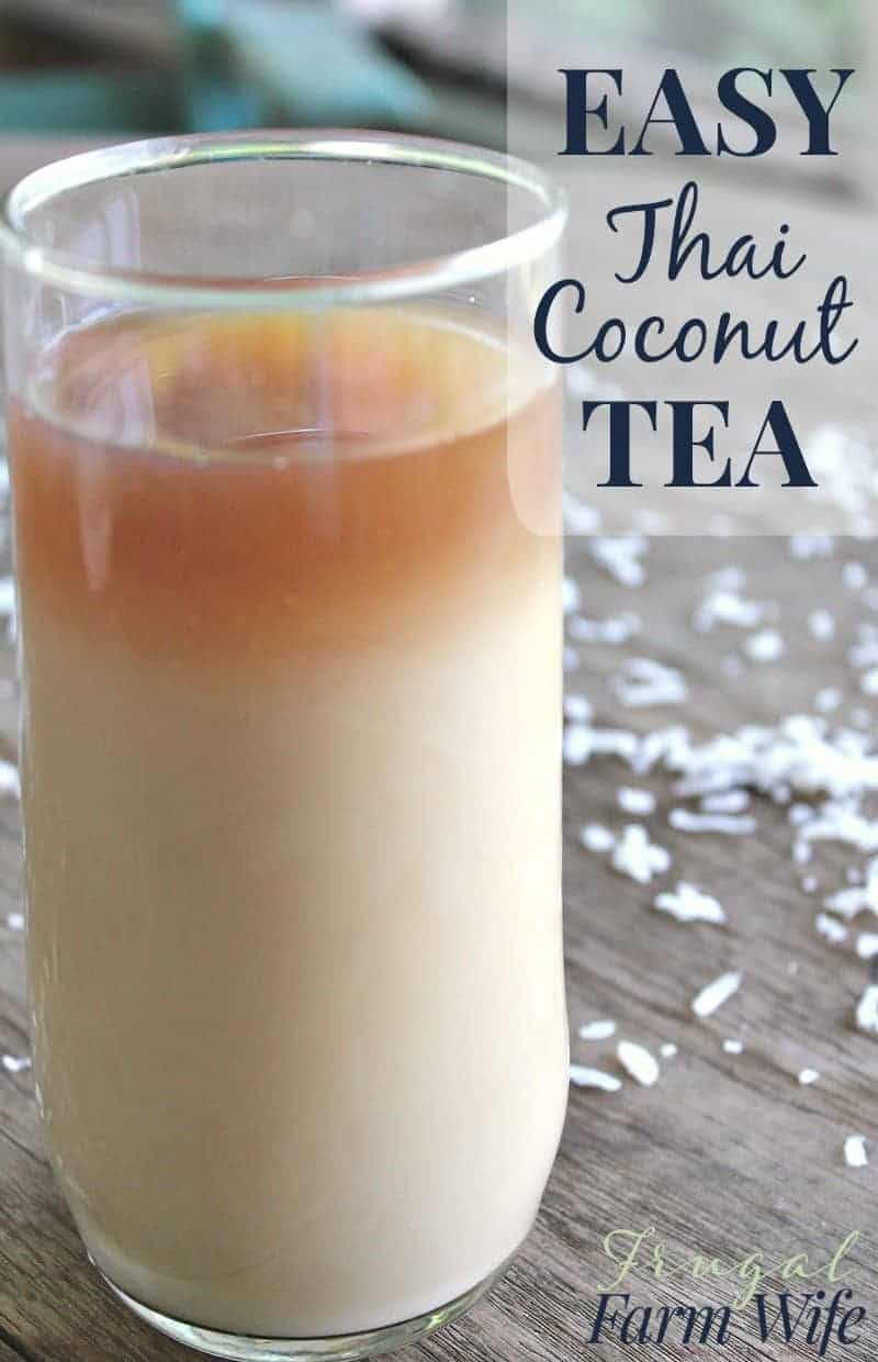 Photo shows a tall glass of Thai Coconut tea on a table. Shredded coconut sits scattered on the table near the glass. Text overlay reads "Easy Thai Coconut Tea"