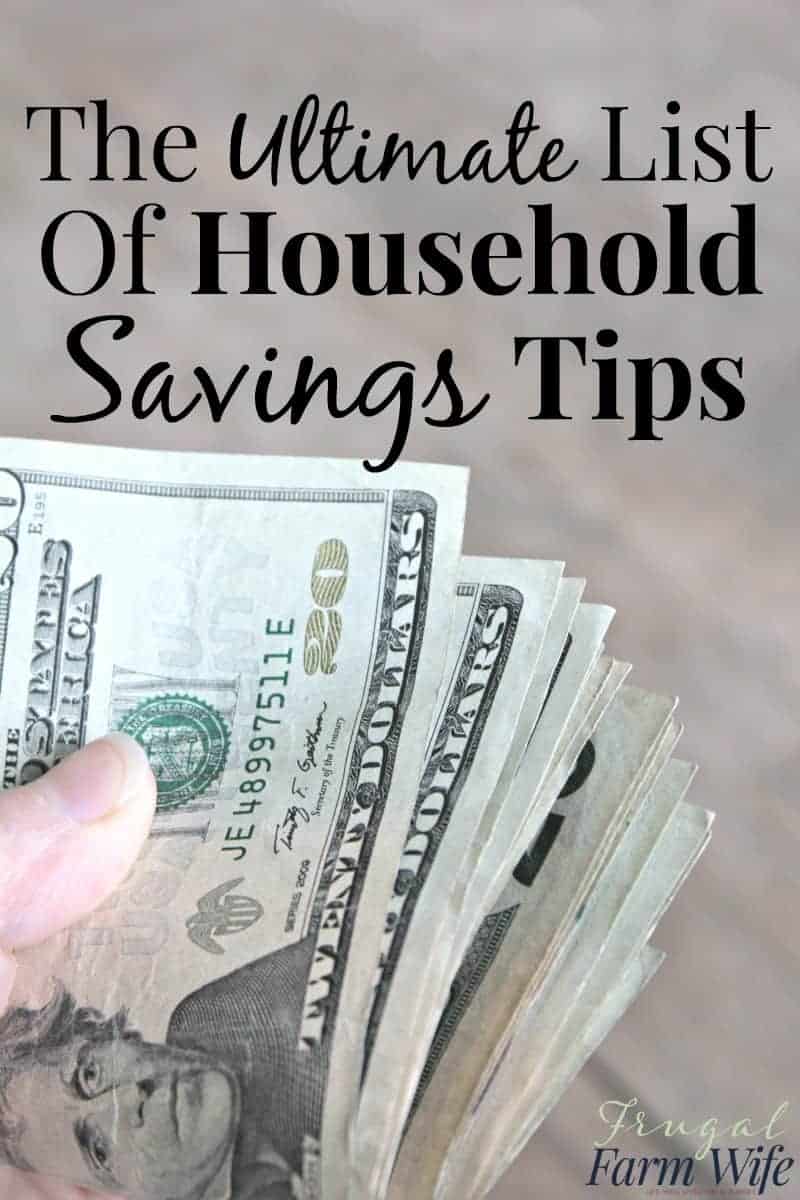 Image shows a hand holding a stack of money with text above that reads "The Ultimate List of Household Savings Tips"
