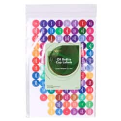 Image shows a clear package of oil bottle cap labels in various colors