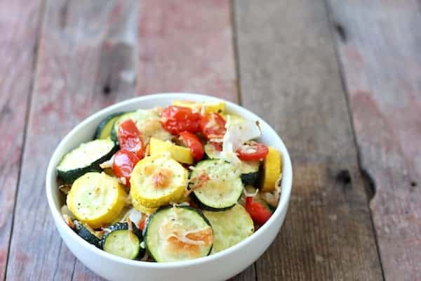 Image shows a bowl of garlic parmesan roasted vegetables
