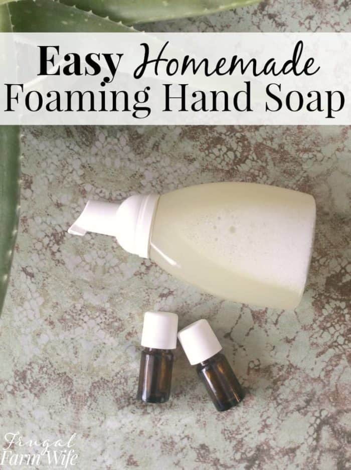 Image shows hand soap, essential oils vials, and text that reads "Easy Homemade Foaming Hand Soap"