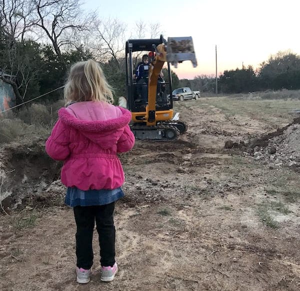 digging pit with a backhoe