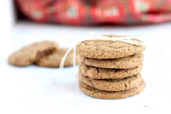 Photo shows a small stack of molasses cookies tied together with a string