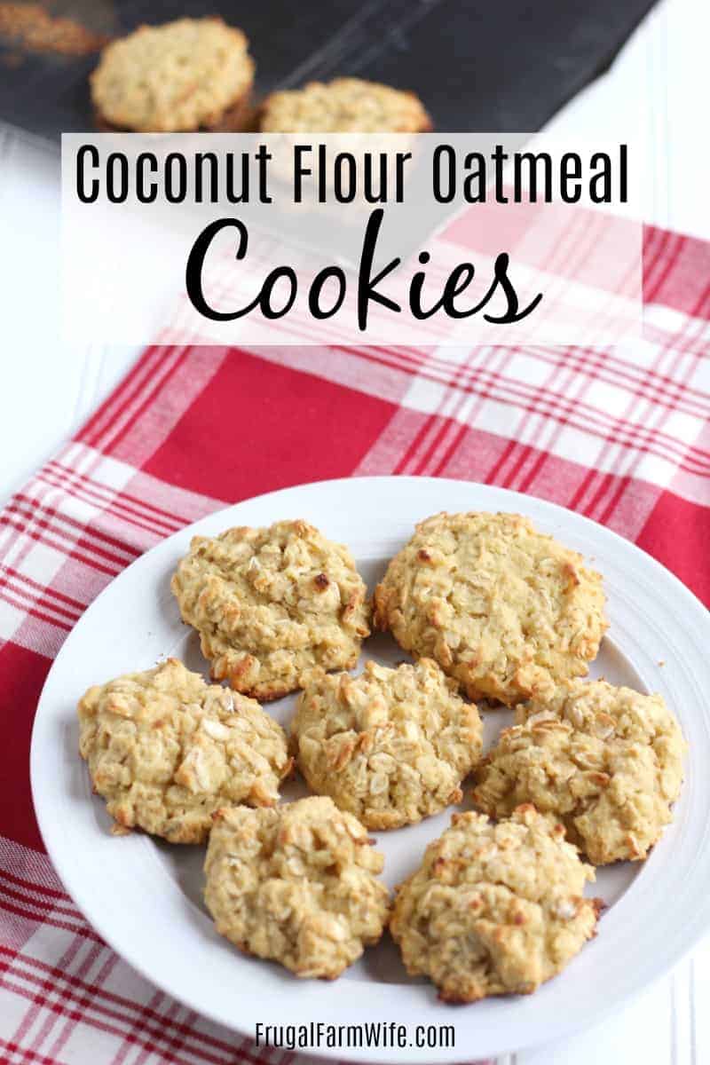 Image shows a plate of coconut flour oatmeal cookies displayed on a red and white checkered tablecloth. Text overlay reads "Coconut Flour Oatmeal Cookies"