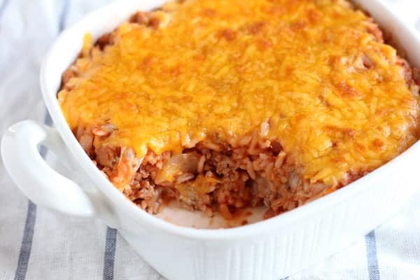 Image shows a casserole dish with cabbage casserole in it