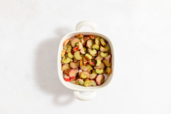A pan with seasoned rhubarb in it. 