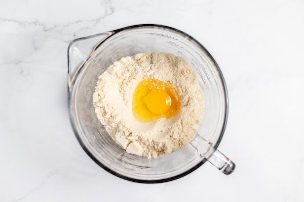 mixing bowl with egg and flour mixture