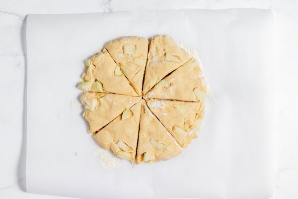 apple scones dough cut into wedges