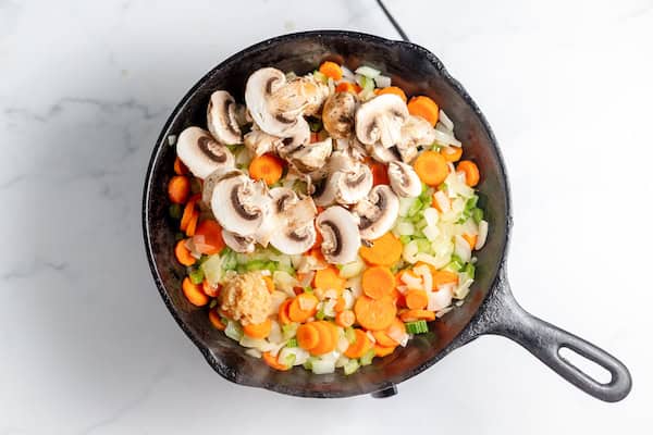 vegetables sauteing in a skillet