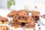 chocolate pecan pie bars on a table