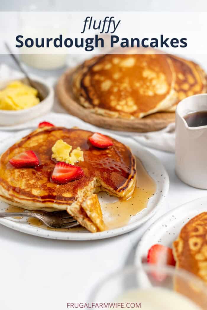 sourdough pancakes served on a plate with strawberries
