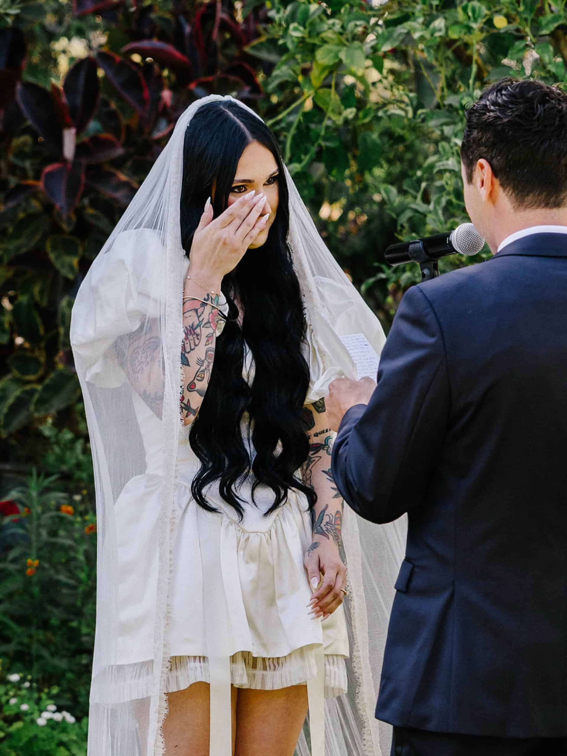 outdoor wedding ceremony at the Madonna Inn; handwritten vows; bridal nail styles and colors
