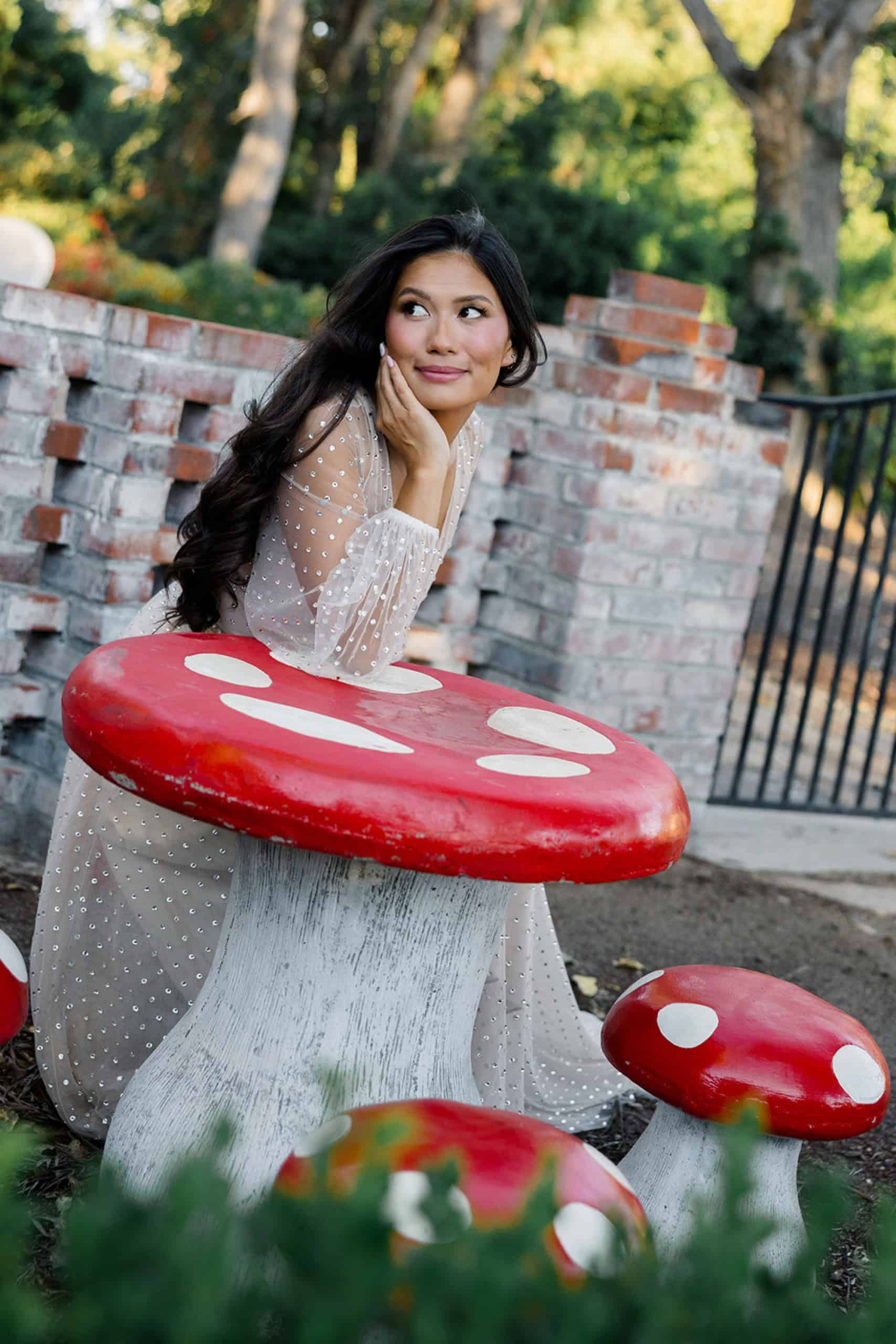 cute bridal portraits with garden mushroom table and chairs