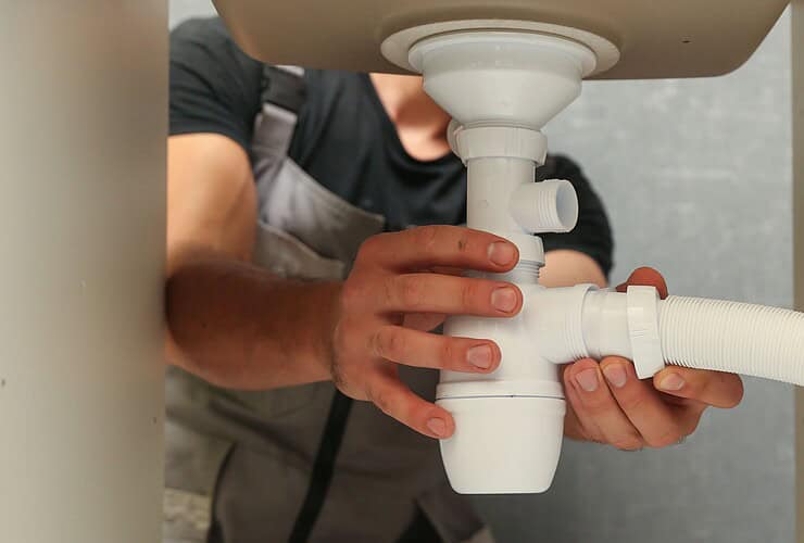 Évacuation d'une lave-vaisselle via un siphon d'évier