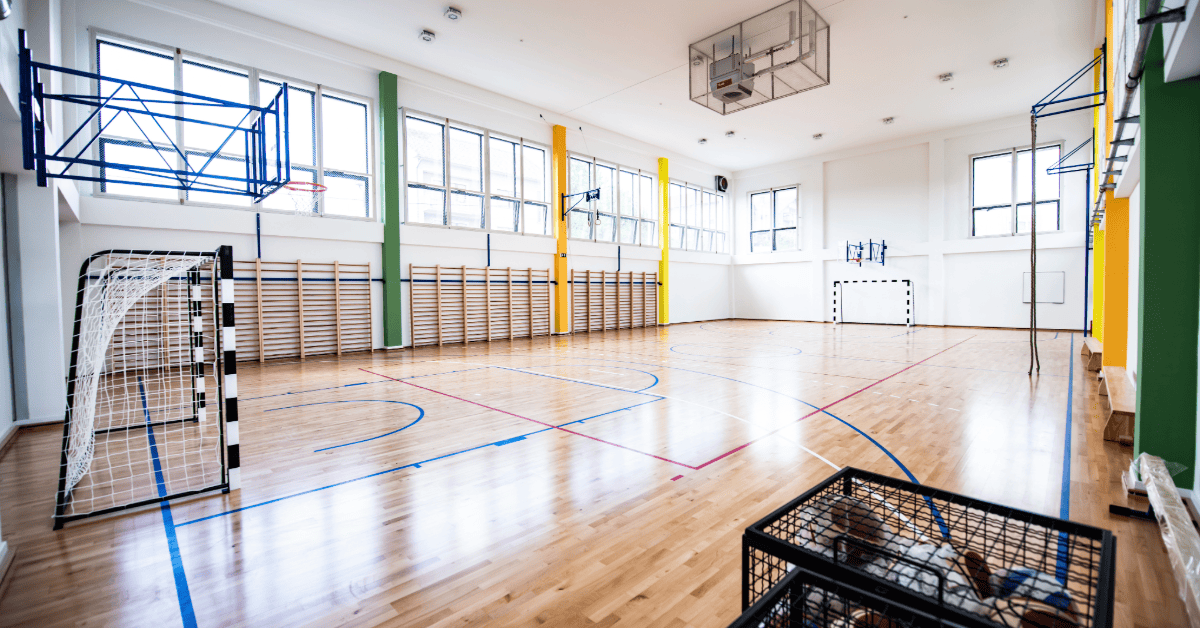 Bright indoor sports facility designed for youth athletic training and activities.