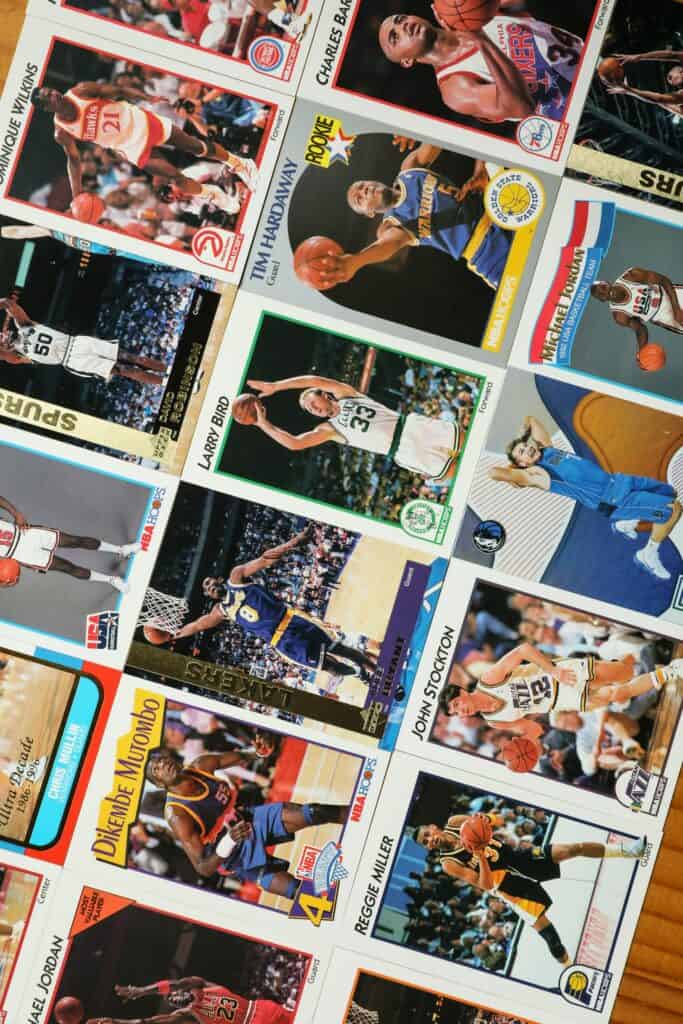 Collection of basketball trading cards featuring youth players in action.