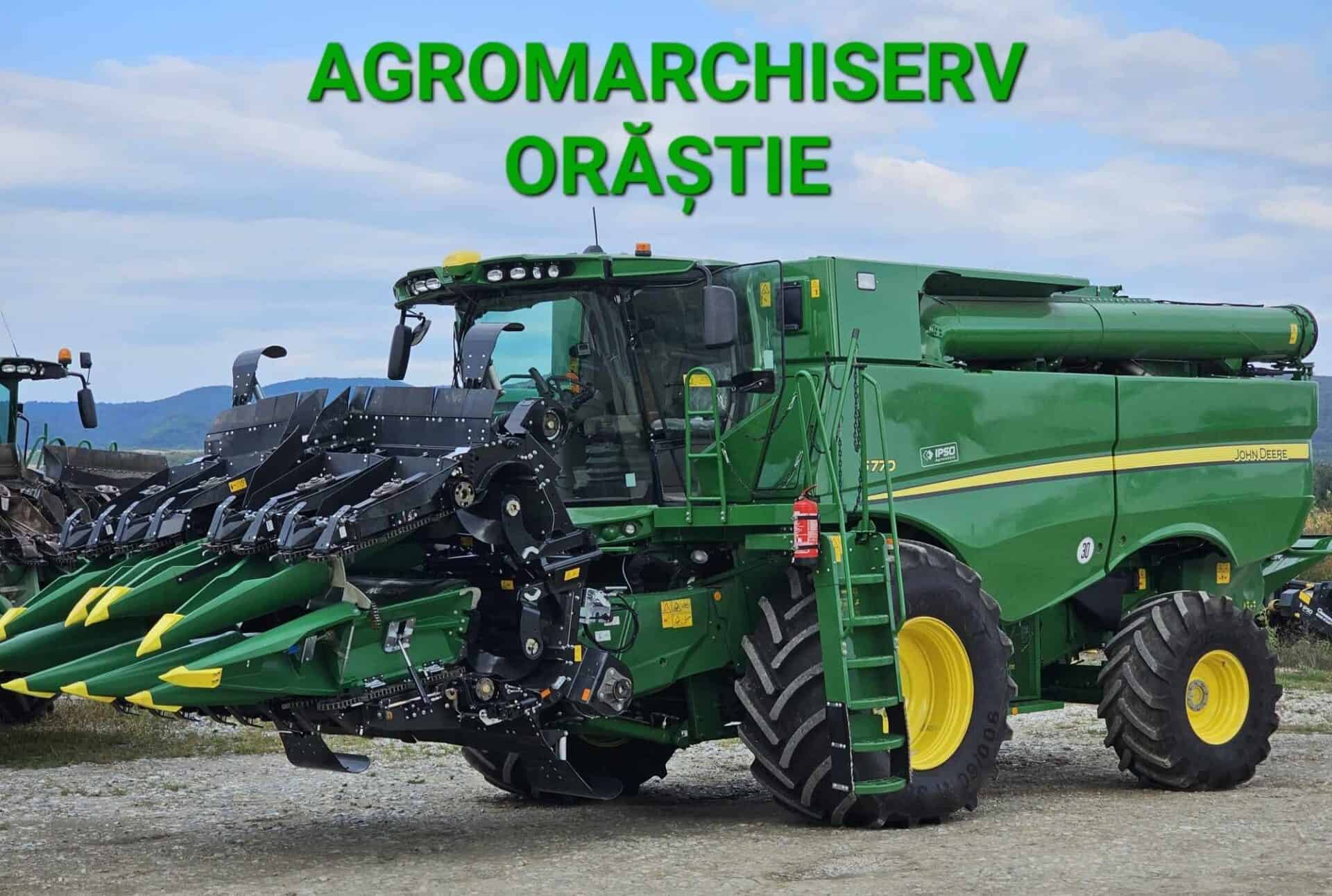 Large green John Deere farming machine at Orastie farm.
