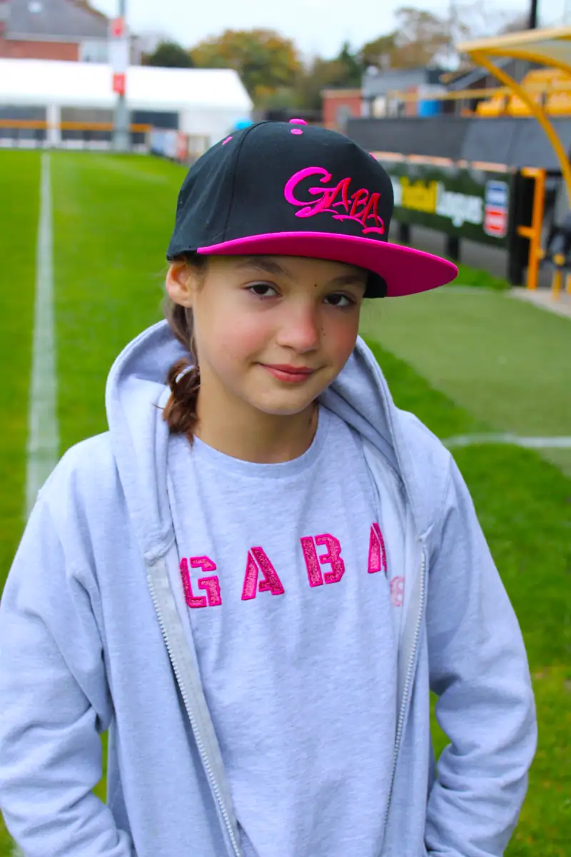 Cap with GABA logo for youth sportswear.