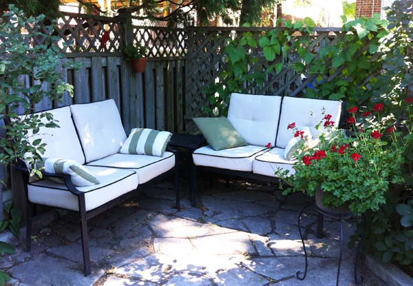 small garden seating area with benches