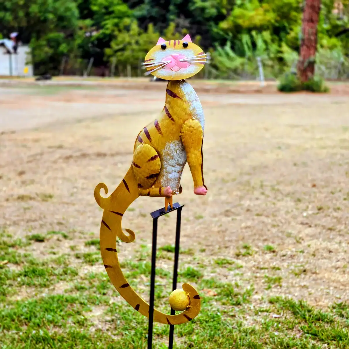 metal cat balancer kinetic sculpture