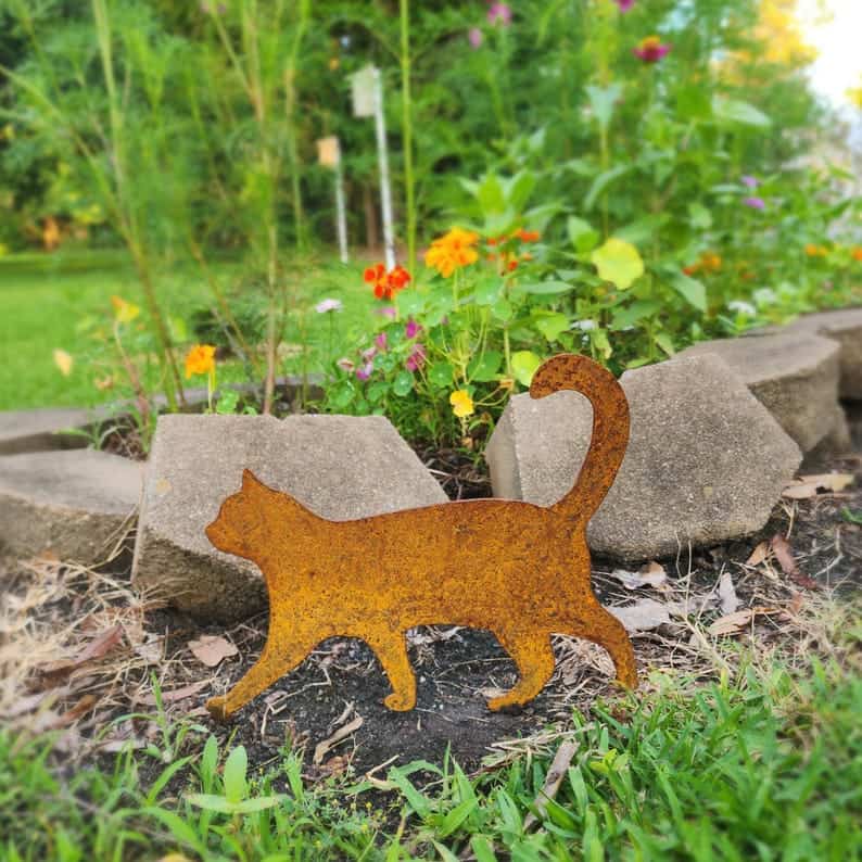 walking rusted metal cat stake