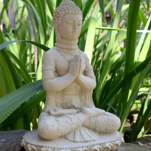 concrete Buddha praying statue