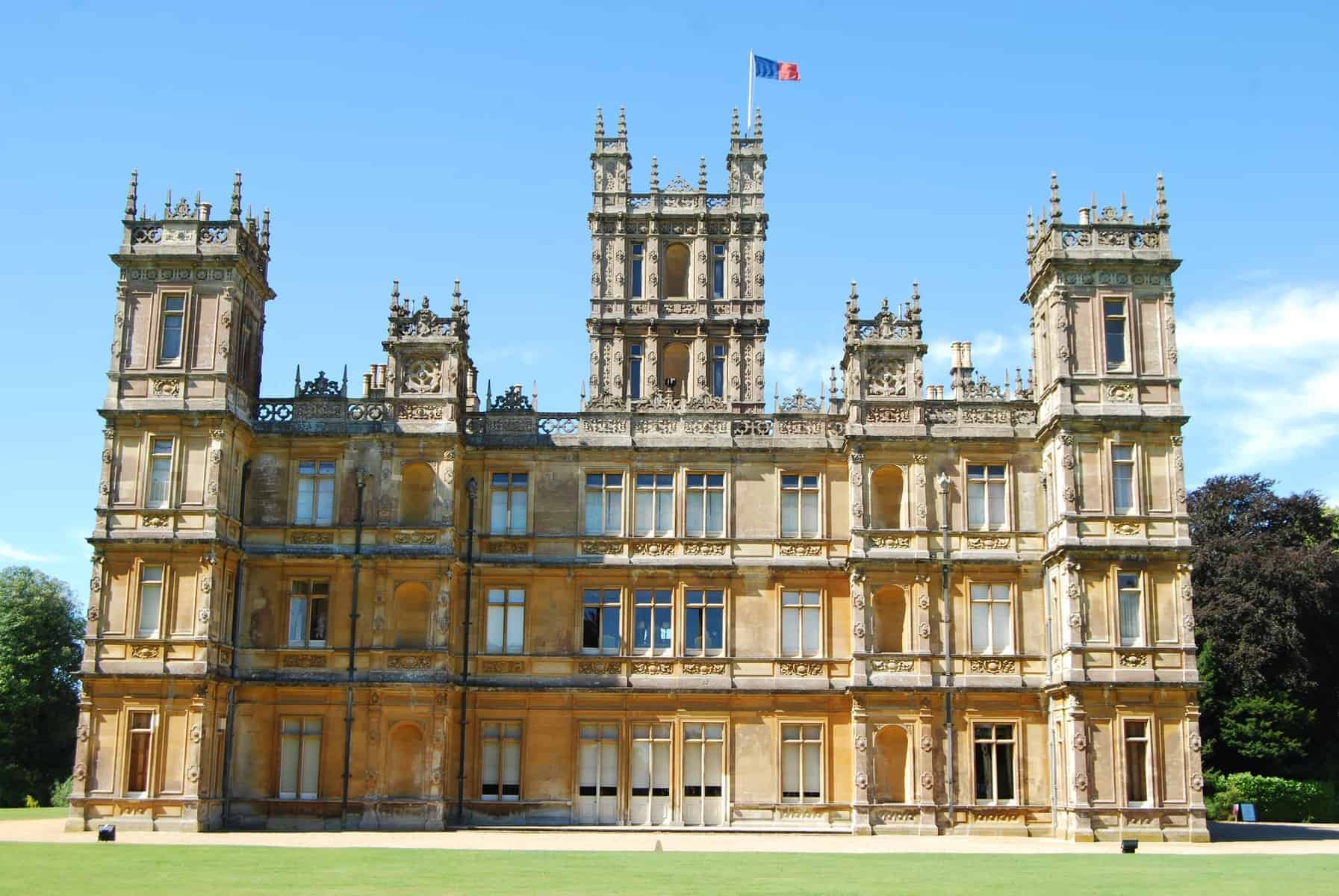 Highclere Castle is a country house in the Jacobean style, with a park designed by Capability Brown. The 5,000-acre estate is in Hampshire, England, United Kingdom, about 5 miles south of Newbury, Berkshire.