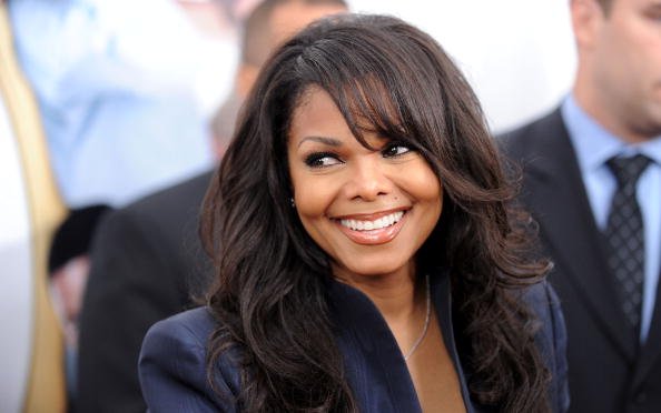 Janet Jackson Net Worth - A Woman Counting Money