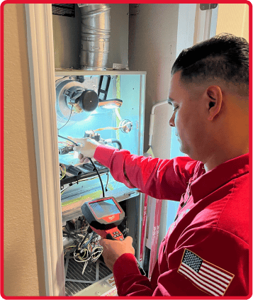 SERVICE-TECH-WORKING-ON-FURNACE SERVICE-TECH-WORKING-ON-FURNACE