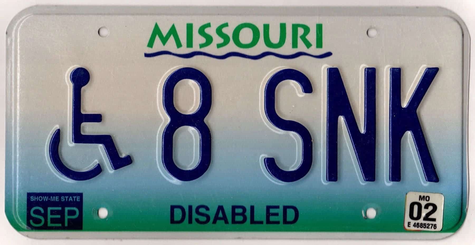 Missouri 2002 handicapped license plate #8 SNK