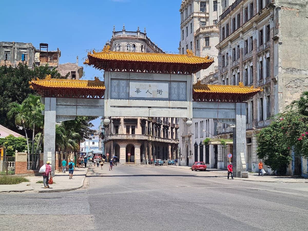A vibrant archway marking the entrance to Havana’s Chinatown, blending traditional Chinese architecture with the tropical charm of Cuba.