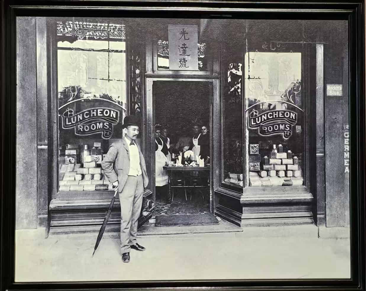 Mr. Mei, a Taishan leader, in front of a Luncheon Rooms business, representing the Guangdong Five Counties diaspora in Australia