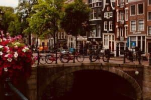 Canals and historic buildings in Amsterdam — a dog-friendly European city ideal for pet relocation.